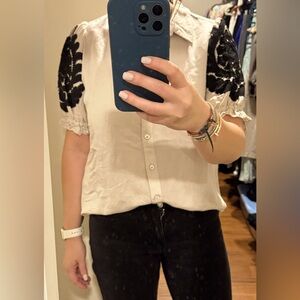 Never worn Chico’s shirt in cream color size 8